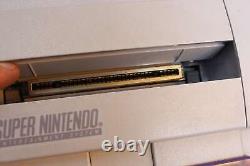 Original Super Nintendo Entertainment System (SNES) Console with 2 games, 1 c