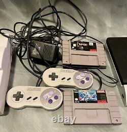 SNES Console + 2 Controllers + 2 Games Super Nintendo Entertainment System