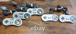 SNES Super Nintendo Bundle 11 Games, 5 controllers, Cleaning cartridge, manual