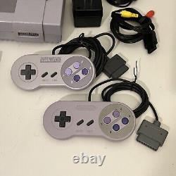 Super Nintendo Entertainment System SNES Console, 2 Controllers, 2 Games TESTED