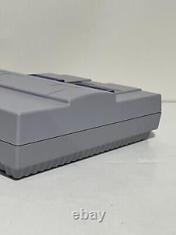 Super Nintendo SNES Console Bundle 2 Controllers Cords Super Mario World Game