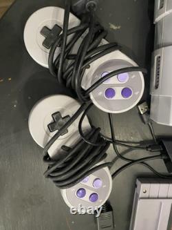 Super Nintendo SNES Console With Controllers And Games