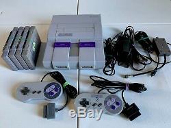 Super Nintendo SNES Console with 2 Controllers, 4 Games, RF Switch, AV RCA SNS-001