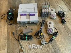 Super Nintendo SNES Console with 2 Controllers, 4 Games, RF Switch, AV RCA SNS-001