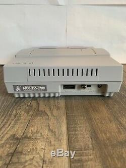 Super Nintendo SNES Console with 2 Controllers, 4 Games, RF Switch, AV RCA SNS-001