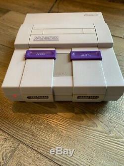 Super Nintendo SNES Console with 2 Controllers, 4 Games, RF Switch, AV RCA SNS-001