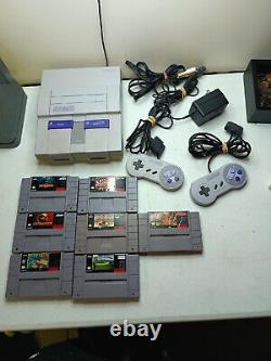 Super Nintendo SNES Console with OEM Controllers + with 7 Games. H6