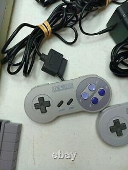 Super Nintendo SNES Console with OEM Controllers + with 7 Games. H6