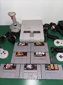 Super Nintendo SNES System Console With7 games & 4 Controllers, AC & A/V Cords