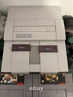 Super Nintendo SNES System Console With7 games & 4 Controllers, AC & A/V Cords