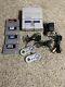 Super Nintendo Snes System Console With 2 Oem Controllers, Cables And 4 Games