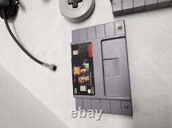 Super Nintendo-SNES With One Controller and Four games