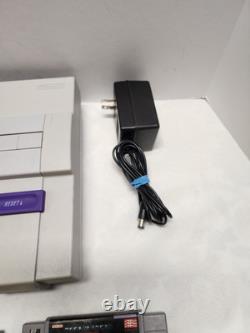 Super Nintendo-SNES With One Controller and Four games