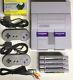 Super Nintendo Snes With Mario World, All Stars, Kart, & Donkey Kong Country