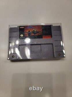 Aero Fighters SNES Super Nintendo 1994 100% AUTHENTIC ORIGNAL GENUINE CART ONLY translated in French is: Aero Fighters SNES Super Nintendo 1994 100% AUTHENTIQUE UNIQUEMENT CARTOUCHE ORIGINALE GÉNUINE