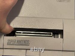 Console SNES + 2 Manettes + 2 Jeux Super Nintendo Entertainment System