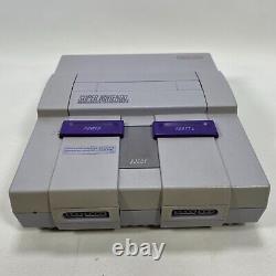 Console Super Nintendo Entertainment System SNES avec 2 manettes et 11 jeux