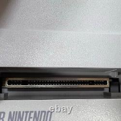 Console Super Nintendo Entertainment System SNES avec 2 manettes et 11 jeux