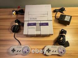 Console Super Nintendo SNES Bundle & 2 manettes en très bon état TESTÉ