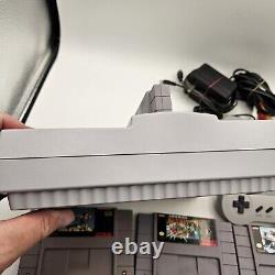 Console Super Nintendo SNES & Bundle de jeux Super Mario (World, All Stars & Kart)