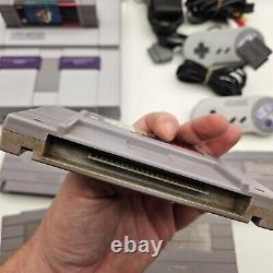 Console Super Nintendo SNES & Bundle de jeux Super Mario (World, All Stars & Kart)