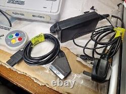 Console Super Nintendo SNES avec 1 manette et câbles entièrement testée
