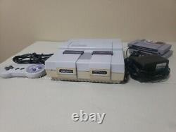 Console Super Nintendo SNES avec 2 jeux et 1 manette