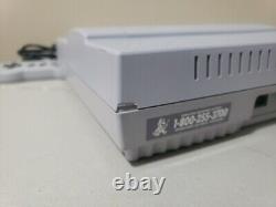 Console Super Nintendo SNES avec 2 jeux et 1 manette