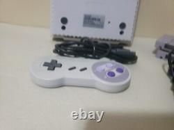 Console Super Nintendo SNES avec 2 jeux et 1 manette