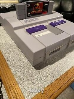 Console Super Nintendo SNES avec 2 manettes et 2 jeux ! Testée, désinfectée.
