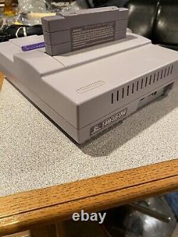 Console Super Nintendo SNES avec 2 manettes et 2 jeux ! Testée, désinfectée.