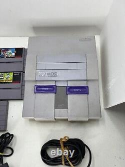 Console Super Nintendo SNES avec 2 manettes, jeux et câbles testés et fonctionnels