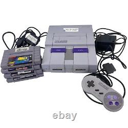 Console Super Nintendo SNES avec 4 jeux, câbles et manette - Testé et fonctionne