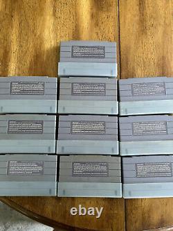 Console Super Nintendo (SNES) avec lot de 10 jeux originaux, boîtiers et couvertures.