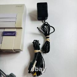 Console Super Nintendo SNES avec manette OEM, câbles et 3 jeux testés