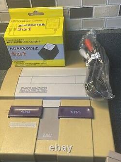 Console Super Nintendo SNES avec manette, câbles et jeux