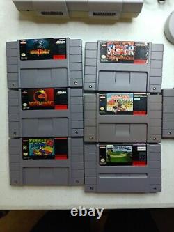 Console Super Nintendo SNES avec manettes OEM + avec 7 jeux. H6