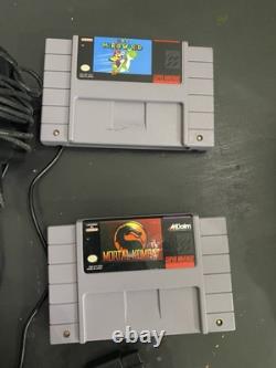 Console Super Nintendo SNES avec manettes et jeux