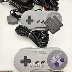 Console Super Nintendo SNES et Pack de Jeux Super Mario (World, All Stars & Kart)