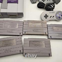 Console Super Nintendo SNES et Pack de Jeux Super Mario (World, All Stars & Kart)