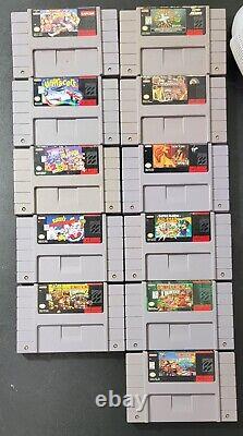 Console de jeu Super Nintendo SNES avec 2 manettes OEM et 11 jeux authentiques propres.