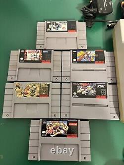 Console de jeu Super Nintendo SNES avec manette et 2 jeux Mario testés