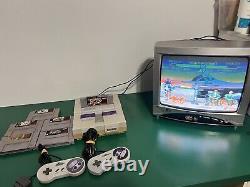 Console de jeu Super Nintendo SNES avec manette et 2 jeux Mario testés