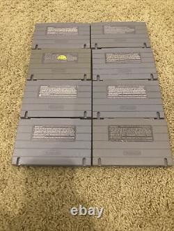 Console de jeu Super Nintendo SNES avec pack OEM de travail comprenant 8 jeux et 2 manettes originales.