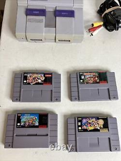 Console de système Super Nintendo SNES avec 4 jeux Mario Kart et 1 manette.