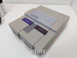 Console de système Super Nintendo SNES avec 4 jeux testés et fonctionnels ! Lire la description.