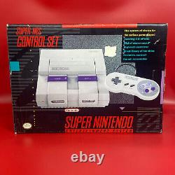 Ensemble de contrôle Super Nintendo SNES dans une boîte avec numéros de série correspondants, preuve d'achat intacte