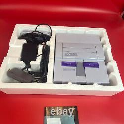 Ensemble de contrôle Super Nintendo SNES dans une boîte avec numéros de série correspondants, preuve d'achat intacte