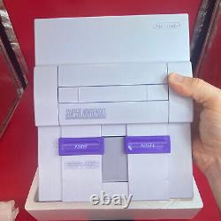 Ensemble de contrôle Super Nintendo SNES dans une boîte avec numéros de série correspondants, preuve d'achat intacte