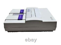 Ensemble de contrôle de la console Super Nintendo SNES avec jeux et manette propre